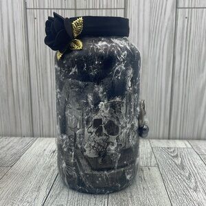 Halloween jar with black skull shape and handmade cotton